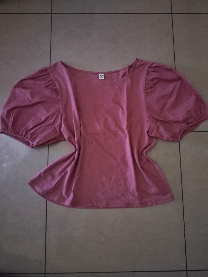 Uniqlo Puff Sleeve Round Neck Top (Category: Blouses) located in Manila. Submitted by bananace143 (Listing ID 1462901425, Image 2). Description: - cute puff sleeve design - round neckline - available in lime green and dusty rose - comfortable and stylish for everyday wear - great for casual outings - SIZE: small, but can fit to medium as well (the buyer will handle the shipping fee) mod: lalamove (if malapit lang), j&t, lbc.