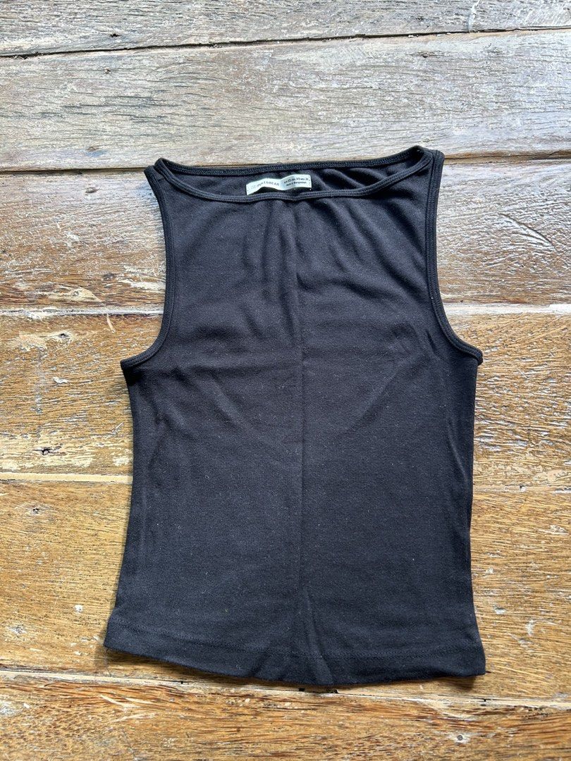 Pull & Bear Black Sleeveless Tank Top (Category: Sleeveless) located in Surigao. Submitted by chastnavarrete (Listing ID 1463036097, Image 1). Description: - Brand: Pull & Bear - Color: Black - Style: Sleeveless tank top - Size: XS - Features: Versatile, great for layering or wearing on its own, comfortable material.