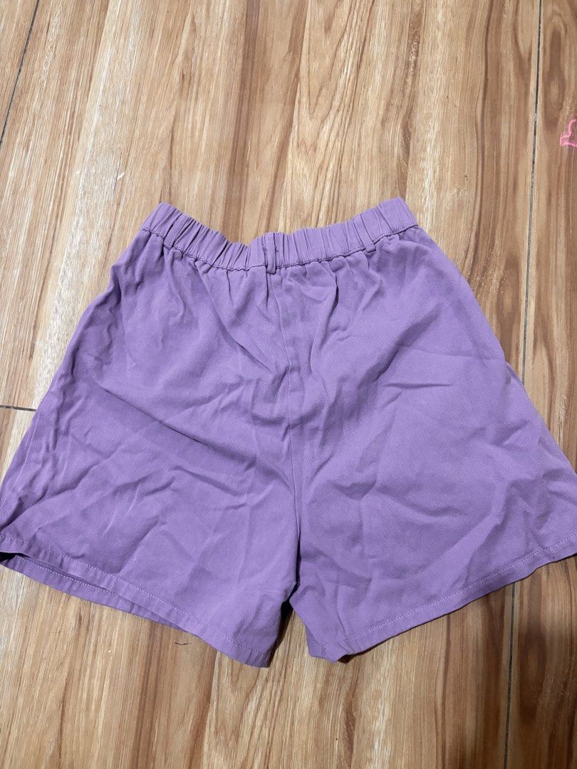 Purple High Waisted Shorts (Category: Shorts) located in Quezon City. Submitted by kyjnll (Listing ID 1463017023, Image 2). Description: W 25-28 - Cute purple shorts - High-waisted design - Pleated front detail - Elastic waistband at the back for comfort - Zipper and button closure - Functional pockets on both sides - Ideal for casual wear Project 4/Cubao area.