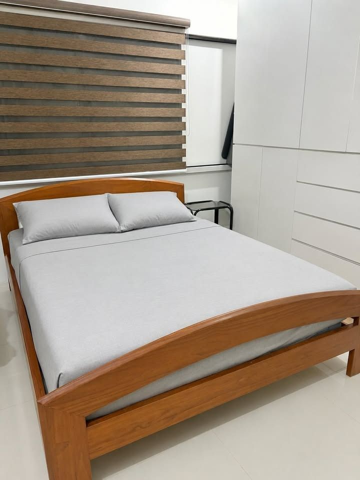 Queen Sized Wooden Bed Frame with Queen Sized Mattress (Category: Bed Frames & Mattresses) located in Caloocan City. Submitted by _argi (Listing ID 1462969154, Image 1). Description: Queen Sized Wooden Bed Frame with Queen Sized Mattress. Sturdy bed frame with included mattress. Good condition and ready for use. 💰 Price: ₱18,000 📦 Condition: Used (Pillows NOT included) 📍 Note: Shipping fee c/o buyer. 📍 Please ensure that someone is available 