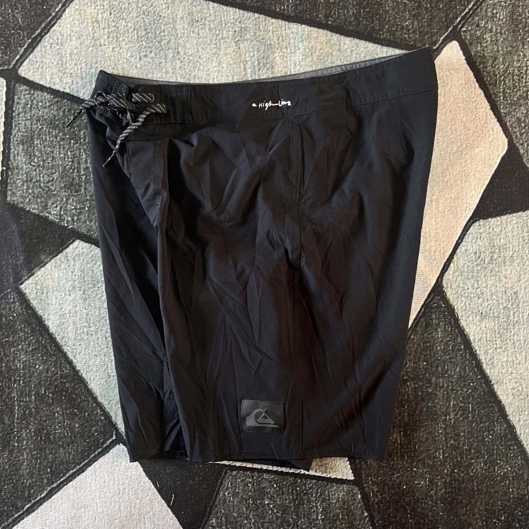 Quiksilver Highline Black Board Shorts (Category: Swim Trunks & Board Shorts) located in Cebu City. Submitted by royalwolf-2a85 (Listing ID 1463022382, Image 1). Description: - Black Quiksilver Highline board shorts - Drawstring waist for a secure fit - Zippered back pocket for essentials - Iconic Quiksilver logo detail - Ideal for swimming, surfing, and beach activities - size 32 - length 19 - like New - no issue .