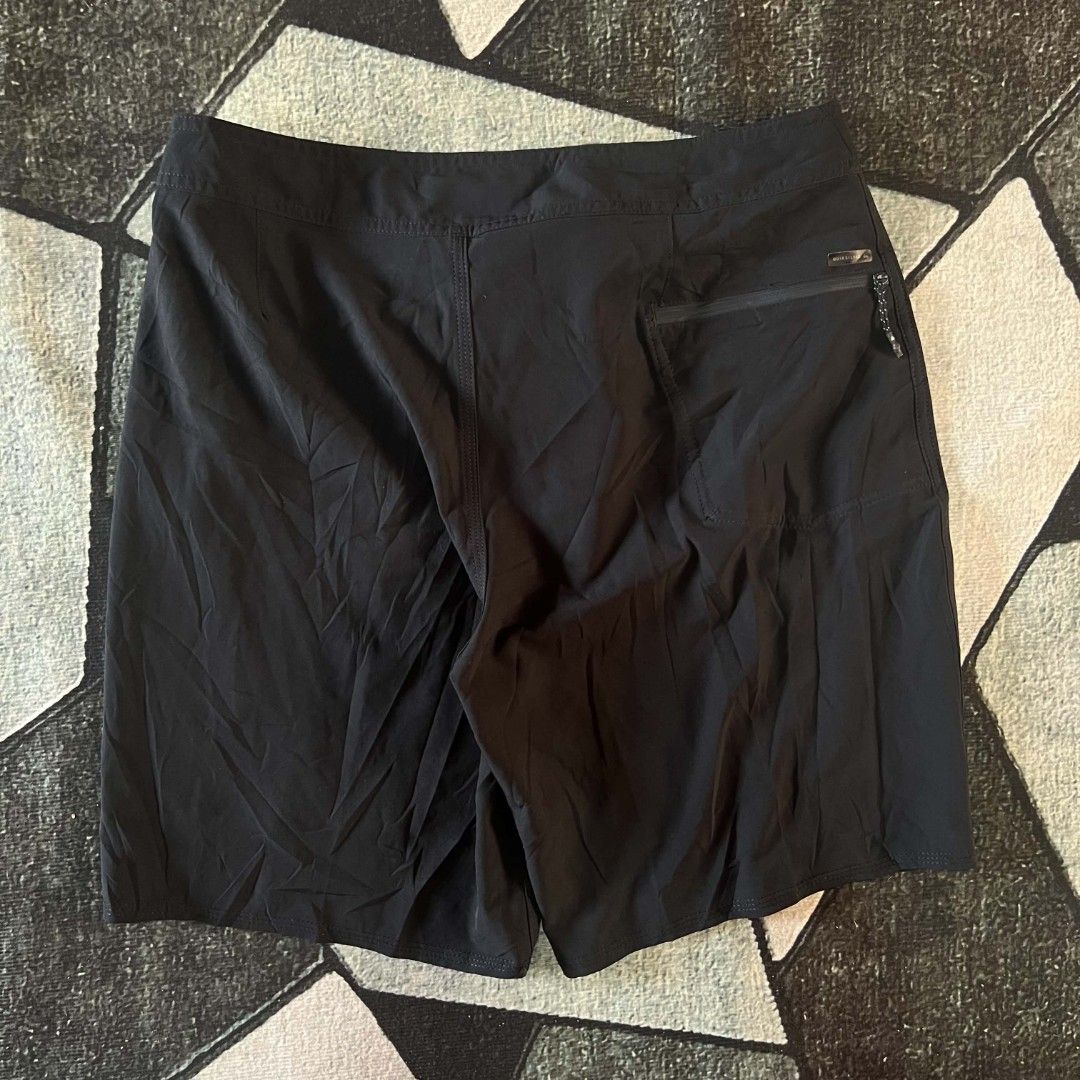 Quiksilver Highline Black Board Shorts (Category: Swim Trunks & Board Shorts) located in Cebu City. Submitted by royalwolf-2a85 (Listing ID 1463022382, Image 3). Description: - Black Quiksilver Highline board shorts - Drawstring waist for a secure fit - Zippered back pocket for essentials - Iconic Quiksilver logo detail - Ideal for swimming, surfing, and beach activities - size 32 - length 19 - like New - no issue .