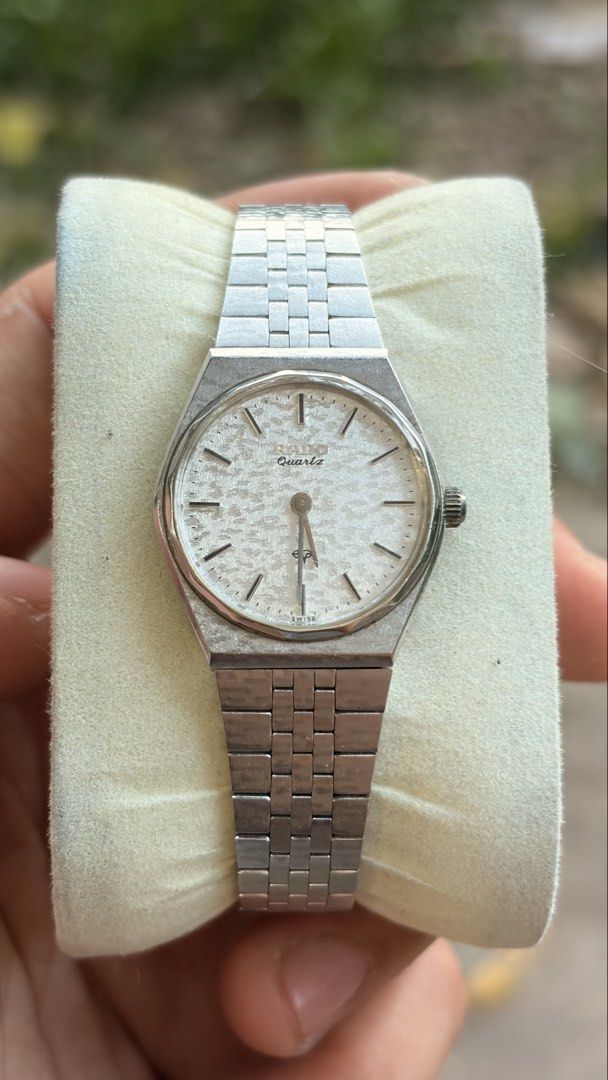 Rado Quartz Watch - Silver Tone (Category: Women's Watches) located in Merida. Submitted by opustimepieces2026 (Listing ID 1463086966, Image 1). Description: - Vintage Rado watch - Silver tone metal bracelet and case - White textured dial with simple hour markers - Quartz movement - Classic, everyday wear design - Requires a new battery.