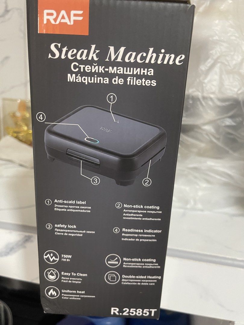 RAF Steak Machine R.2585T - 750W Grill (Category: BBQ, Grills & Hotpots) located in Malabon City. Submitted by charlize.ph (Listing ID 1462905709, Image 3). Description: - RAF Steak Machine, Model R.2585T - Powerful 750W for quick and even cooking - Non-stick coating for effortless cleaning - Double-sided heating for perfect results every time - Floating hinge system automatically adjusts to food thickness - Built-in safety lock for secure operat