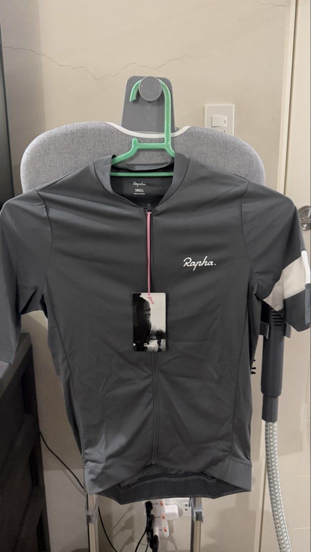 Rapha Cycling Jersey - Grey - Size Small (Category: Activewear) located in Tarlac. Submitted by happy_gilmore (Listing ID 1462894914, Image 1). Description: - Brand new Rapha cycling jersey - Size: Small - Short sleeves with white arm accents - Full zip front with pink zipper pull - Tags still attached - Perfect for your next cycling adventure! - Tarlac Area - Meetups around Tarlac - Shipping buyer’s expense.