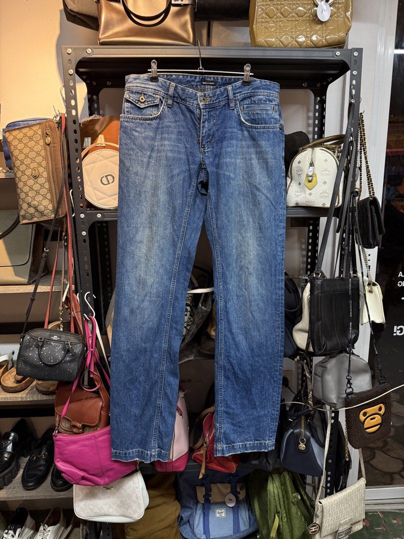 Rare y2k D&G jeanius mind jeans (Category: Jeans) located in Legazpi City. Submitted by deadthrift (Listing ID 1463040925, Image 2). Description: - size 31 on tag - fits to 32-34 - length 43 - Originating from the late 1990s to the early 2000s, these jeans are a prime example of the bold, logocentric Y2K aesthetic pushed by Dolce & Gabbana's D&G diffusion line.The distinctive "New Vintage Jeanius Mind" leather patch was part of a limited-run coll