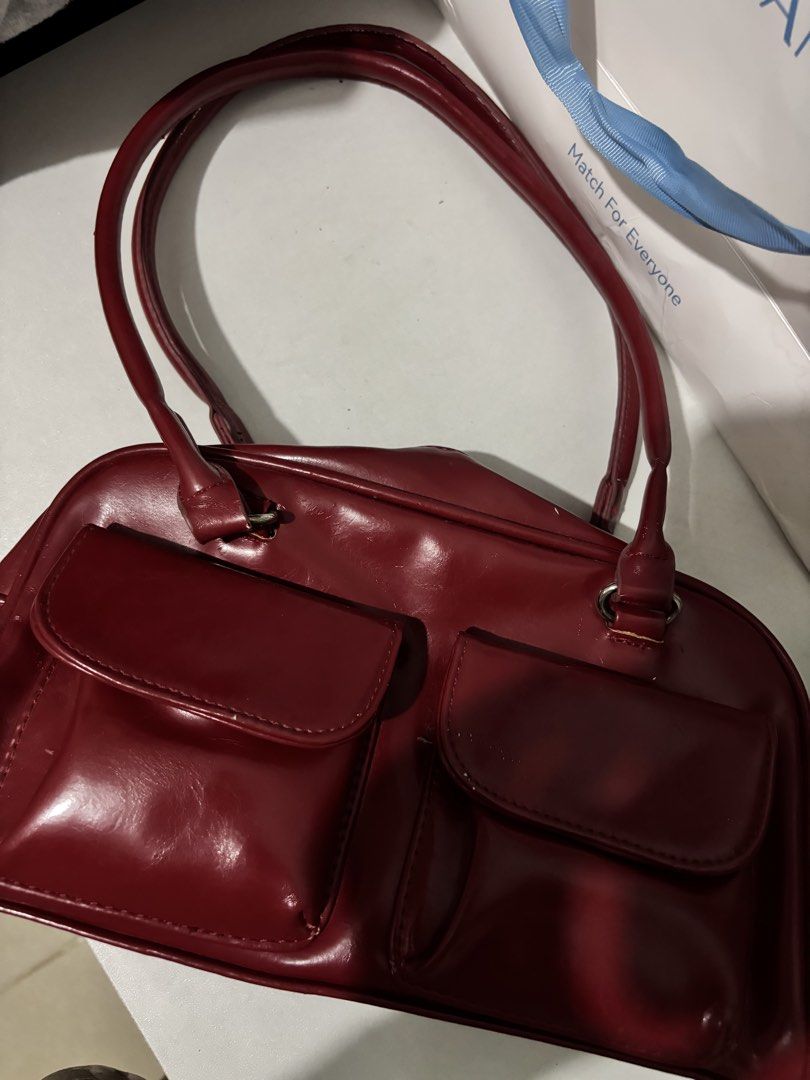 red bag with two pockets on front (Category: Shoulder Bags) located in Manila. Submitted by iyahpreloved_ (Listing ID 1463020677, Image 1). Description: red bag has sign of usage still nego! .