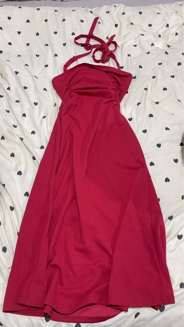 Red Halter Neck Ruched Midi Dress (Category: Dresses) located in Manila. Submitted by mallowieee (Listing ID 1463003571, Image 2). Description: - Stunning red midi dress - Elegant halter neck design - Flattering ruching detail on the bodice - Flowy skirt for a graceful silhouette - Secure tie-back closure - Ideal for evening events or special occasions - Comfortable to wear.