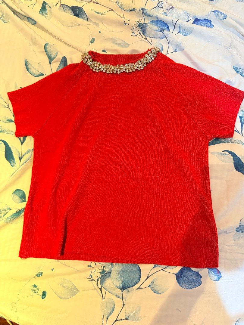 Red Knit Top with Embellished rhinestone (Category: Blouses) located in Cebu City. Submitted by cutexoxoshop (Listing ID 1463047590, Image 1). Description: - Chic red knit top - Short sleeves for comfort - Eye-catching collar adorned with rhinestones and beads - Versatile piece: dress up or down - Ready for its new owner!.