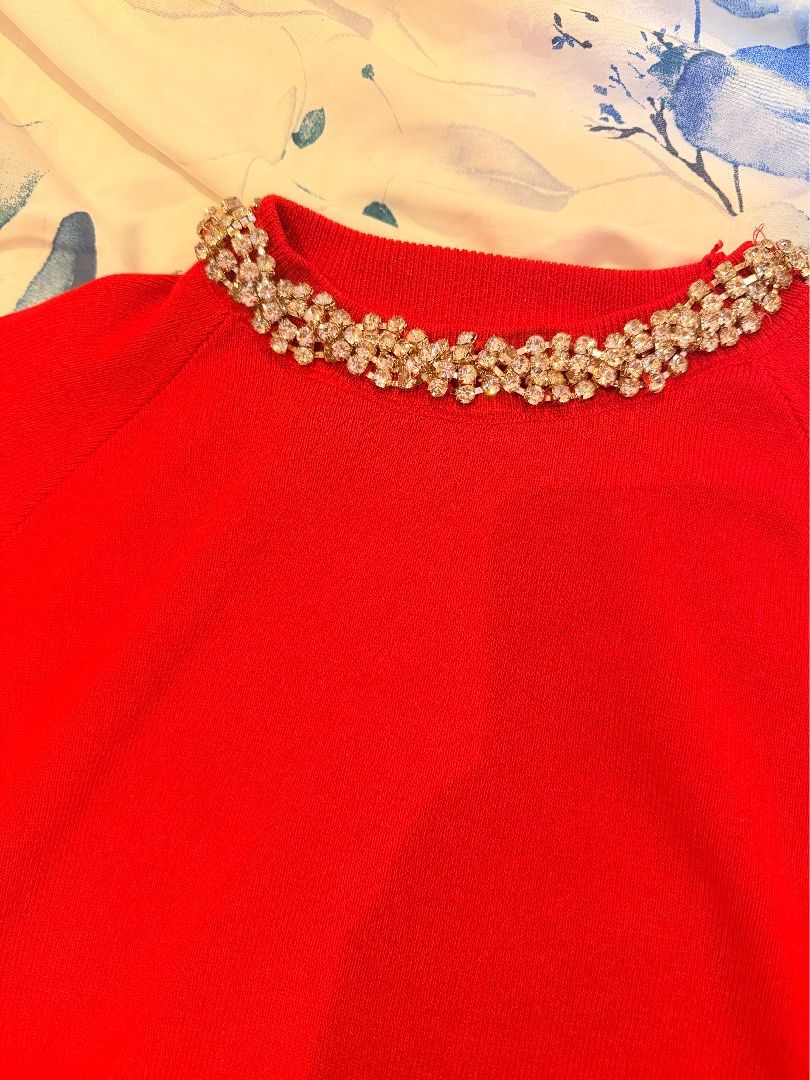 Red Knit Top with Embellished rhinestone (Category: Blouses) located in Cebu City. Submitted by cutexoxoshop (Listing ID 1463047590, Image 2). Description: - Chic red knit top - Short sleeves for comfort - Eye-catching collar adorned with rhinestones and beads - Versatile piece: dress up or down - Ready for its new owner!.