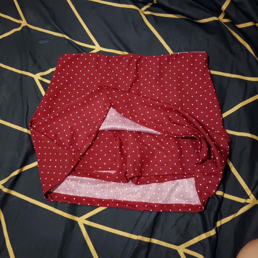 Red Polka Dot Mini Skirt (Category: Skirts) located in Valenzuela. Submitted by timoylazaro (Listing ID 1463056781, Image 2). Description: - Adorable red mini skirt with white polka dots. - Features built-in shorts for added coverage and comfort. - Made with stretchy material for a great fit. - Perfect for casual wear or a night out. - Versatile and easy to style with any top..