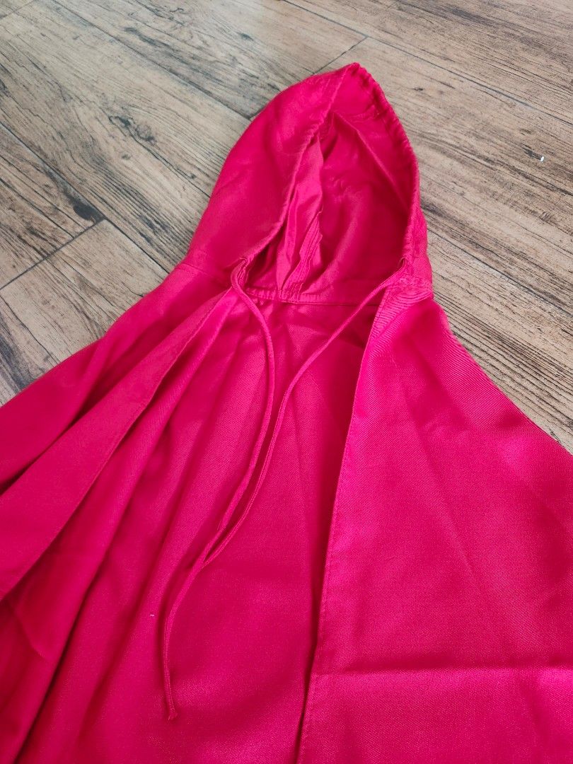 Red riding hood costume (Category: Babies & Kids Fashion) located in Las Pinas. Submitted by closetful.ph (Listing ID 1463036145, Image 1). Description: - can partner with any red dress - Features a functional drawstring on the hood - Fabric has a subtle sheen for added flair - Ideal for costumes, parties, and fun events.