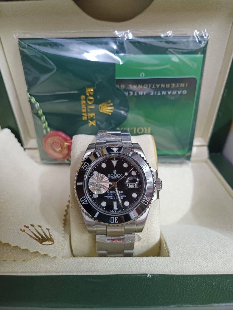 Rolex Submariner Watch - Black, Green, Blue Bezel Options (Category: Luxury Watches) located in Manila. Submitted by chaionlineshop (Listing ID 1462997921, Image 1). Description: - Authentic Rolex Submariner watch - Comes complete with original box and warranty card - Choose from three stunning bezel colors: classic black, vibrant green, or deep blue - An exceptional timepiece for any discerning watch collector - Message us for more details and p