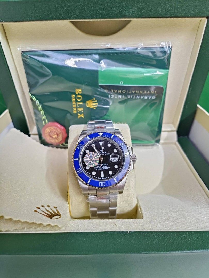 Rolex Submariner Watch - Black, Green, Blue Bezel Options (Category: Luxury Watches) located in Manila. Submitted by chaionlineshop (Listing ID 1462997921, Image 3). Description: - Authentic Rolex Submariner watch - Comes complete with original box and warranty card - Choose from three stunning bezel colors: classic black, vibrant green, or deep blue - An exceptional timepiece for any discerning watch collector - Message us for more details and p