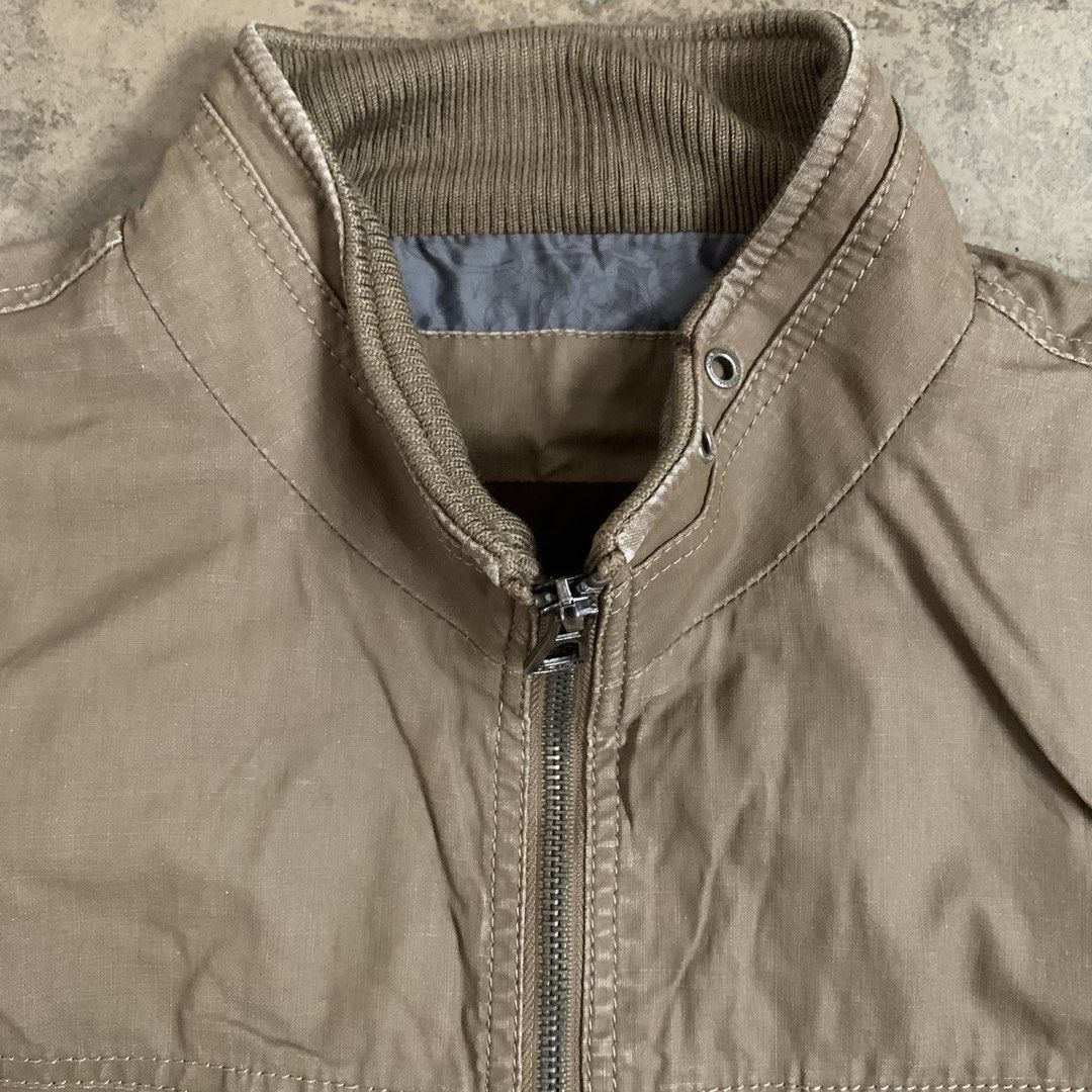 ROMON Classic Design Quality Khaki Jacket XL (Category: Coats, Jackets and Outerwear) located in Manila. Submitted by thriftnivee (Listing ID 1463031708, Image 3). Description: - ROMON Khaki Jacket - Classic design with quality construction - Zip-up front - Multiple pockets, including a zippered chest pocket - Ribbed collar detail - Size XL - Great for casual wear.