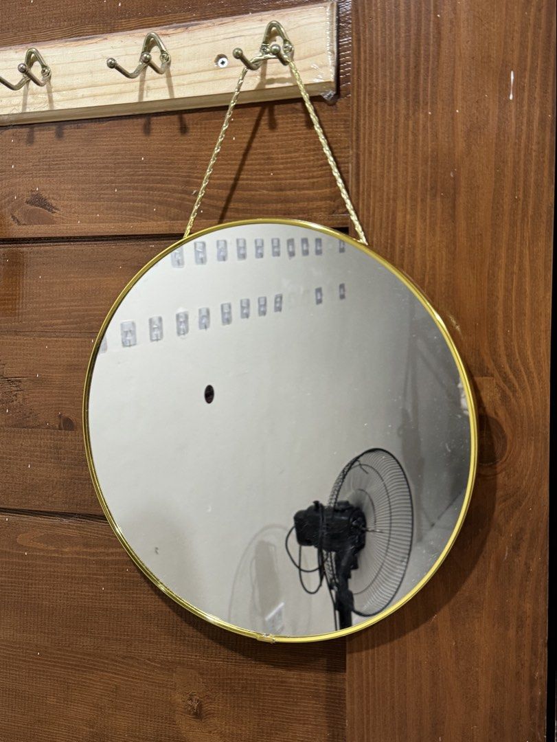 Round Mirror (Category: Mirrors) located in Quezon City. Submitted by aeslaehc (Listing ID 1463059010, Image 1). Description: DECLUTTERING SLAE! • Round Mirror with gold plated round edges • Used once for photoshoot • No issues.