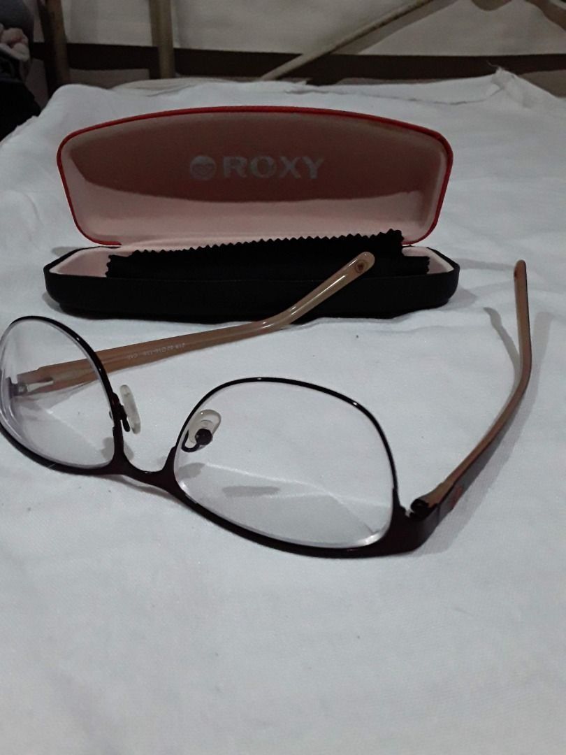 Authentic ROXY Cat Eye Preloved Eyeglasses (Like New) (Category: Sunglasses & Eyewear) located in Marikina City. Submitted by rogaepupa (Listing ID 1462955099, Image 2). Description: Authentic ROXY Eyewear / Eyeglasses Frame Condition: Like New (9.5/10). Slightly used 2 to 3 times only. No scratches, no stains, and no structural flaws. Very fresh and clean. Features & Design: - Style: Trendy Cat-Eye / Full Rim frame design - Color: Two-tone elega