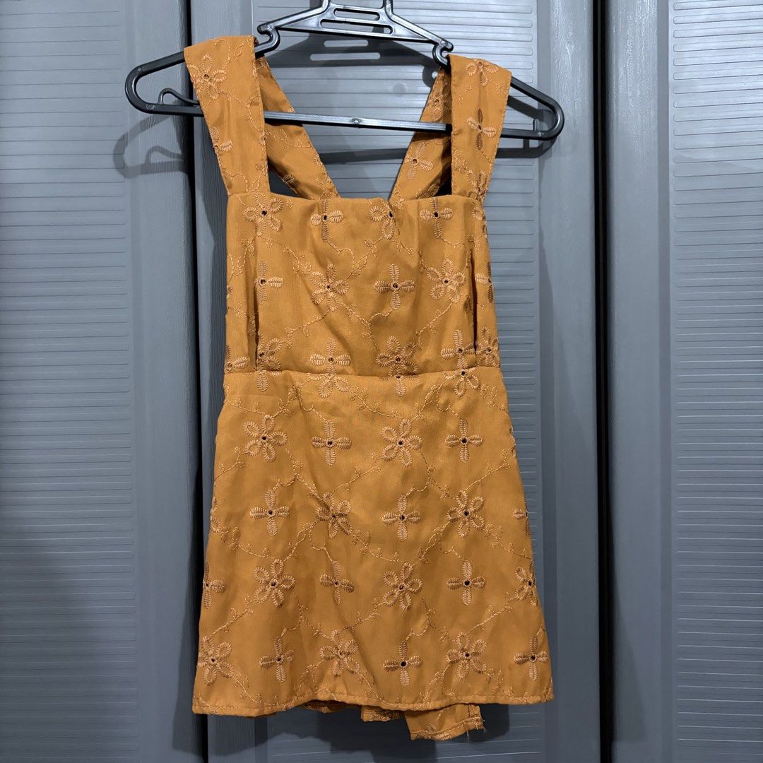 Rust Camel Sleeveless Backless Embroidered Top (Category: Sleeveless) located in Quezon City. Submitted by iywm_ (Listing ID 1462999427, Image 1). Description: ▪️never used ▪️rfs: decluttering ▪️shipping via grab or lalamove only 📍loyola heights, qc.