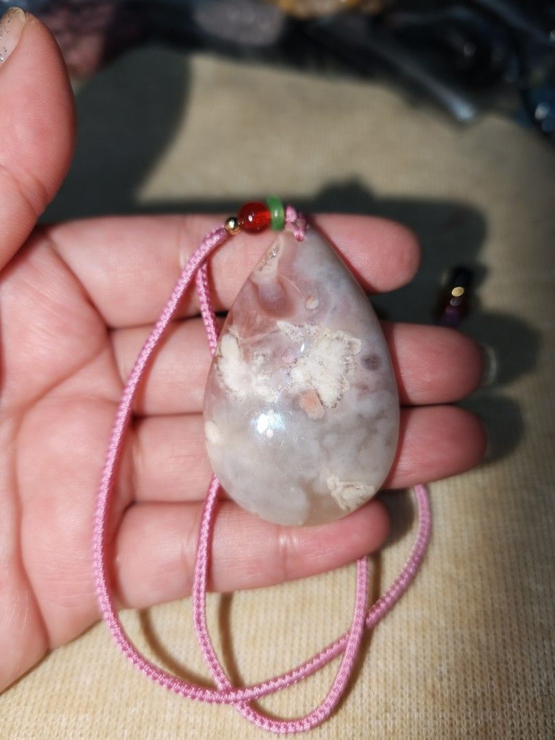 Sakura Agate Big Teardrop Necklace (Category: Necklaces) located in Quezon City. Submitted by piaoliangcollections.ph (Listing ID 1463093746, Image 2). Description: Emotional Healing: Soothes stress, anxiety, and fear while helping you release past emotional wounds or a broken heart. Personal Growth: Acts as a "Stone of Growth," encouraging you to blossom into your full potential at a steady, patient pace. Joy and Optimism: Inspires a positive ou