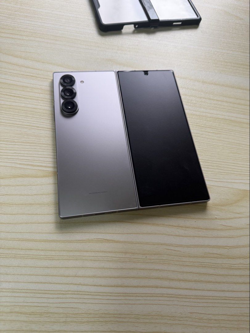 Samsung ZFold 6 512Gb Openline (Category: Samsung) located in Bacoor. Submitted by Yosab (Listing ID 1462386507, Image 1). Description: Sale or Swap sa Lower unit plus cash Samsung Z Fold 6 5G (Silver Shadow) Foldable QXGA+ Dynamic AMOLED 2X 120Hz Refresh Rate / HDR10+ Corning Gorilla Glass Victus 2 Qualcomm Snapdragon 8 Gen 3 24gb Ram (12+12gb) 512Gb Storage Inclusion: Unit Case Cord Screen Protector Installed Openline | Anysim Will Do Dualsim |