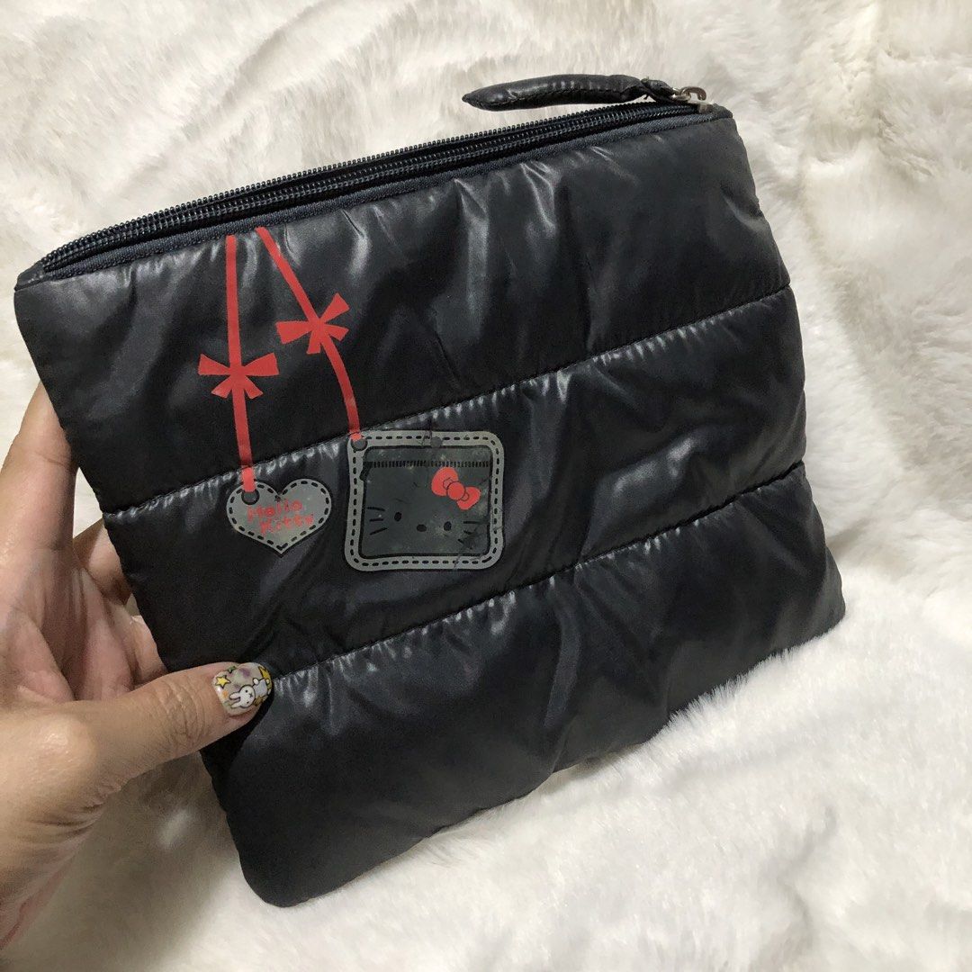 Sanrio Hello Kitty Puffer Pouch (Category: Purses & Pouches) located in Quezon City. Submitted by kitsune.treasures (Listing ID 1462898259, Image 2). Description: *First to pay policy! *1 day reservation only. Failure to pay on time, auto cancel. 📍Quezon City * MOD: J&T | Lalamove * MOP: GCASH | BPI 📦ON HAND AND READY TO SHIP! CONDITION: WHAT YOU SEE IS WHAT YOU GET. Dimensions: Kindly check the photos for the actual measurements. Please check 