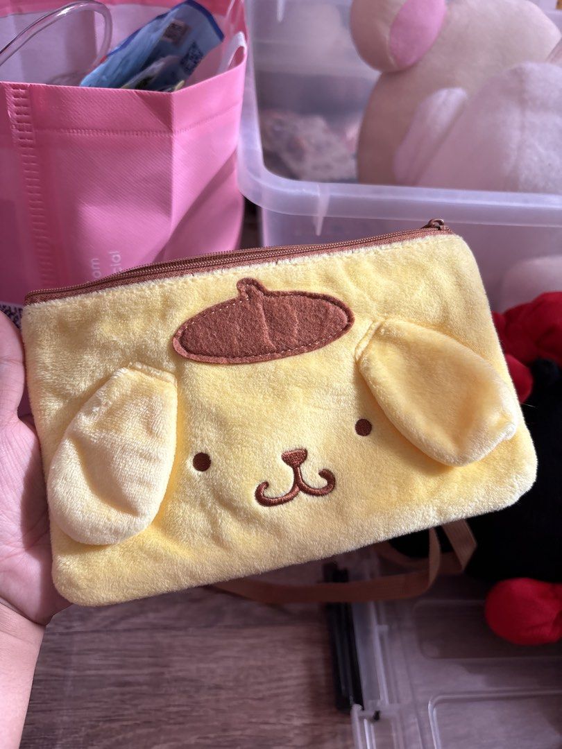 Sanrio Pompompurin Plush Pouch Bag (Category: Purses & Pouches) located in Bulacan. Submitted by littletrinks (Listing ID 1462967535, Image 1). Description: fits similar size of samsung 24s ultra.
