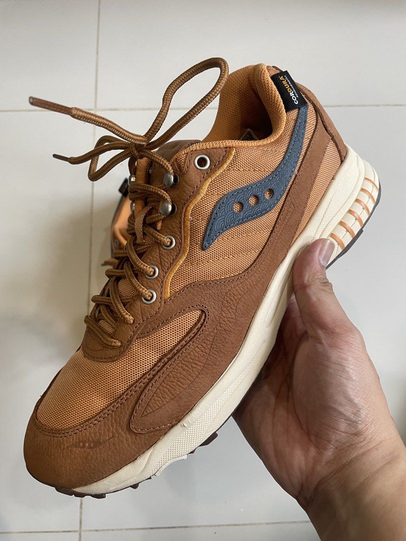 Saucony 3D Grid Hurricane (Category: Sneakers) located in Consolacion. Submitted by pau.magpantay (Listing ID 1462886226, Image 2). Description: Saucony 3D Grid Hurricane sneakers in brown. - Size US 11 / UK 10 / EUR 45 / CM 29. - With box.