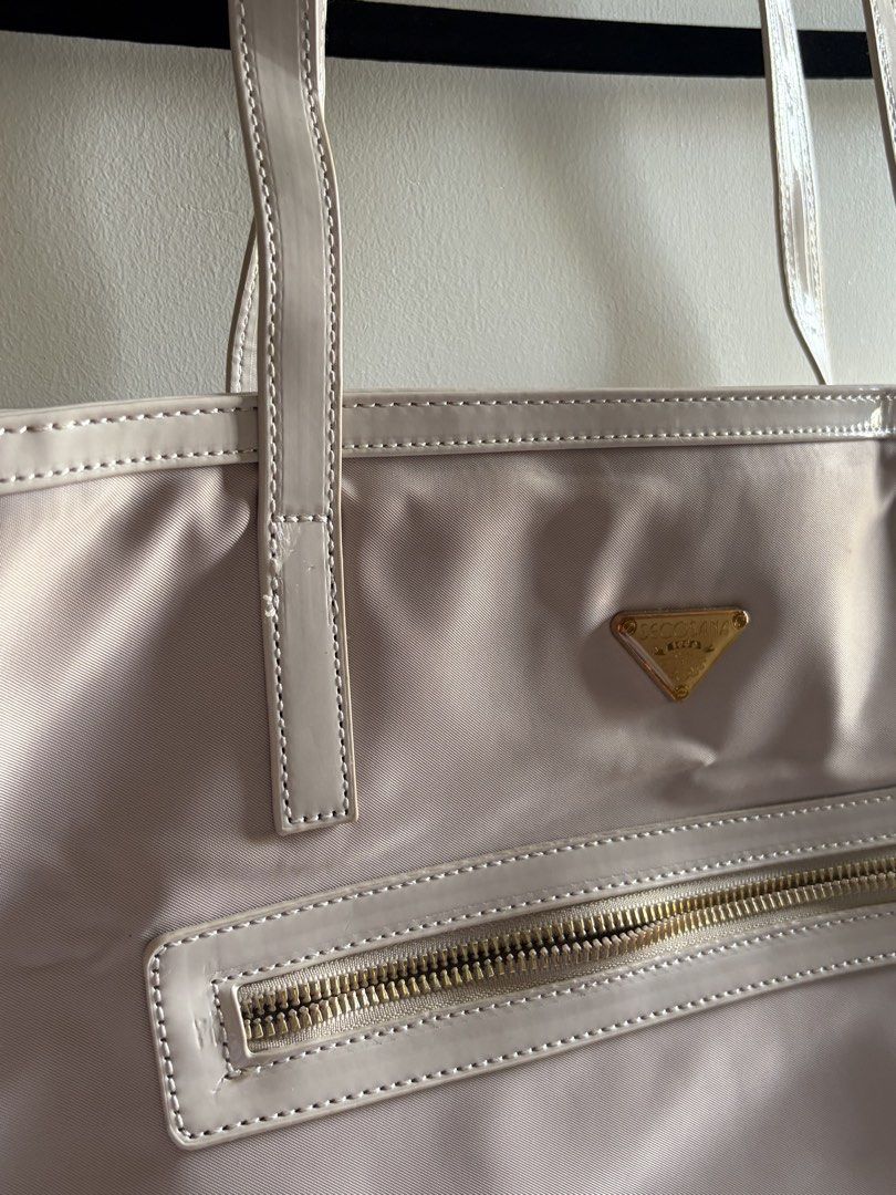 Secosana Nylon Tote Bag Beige (Category: Tote Bags) located in Tarlac. Submitted by ignaciocha729 (Listing ID 1462894293, Image 2). Description: - Beige nylon tote bag - Patent leather trim - Gold hardware details - Front zip pocket - Interior zip pocket - Spacious interior - Ideal for everyday use or travel Lightly used! .