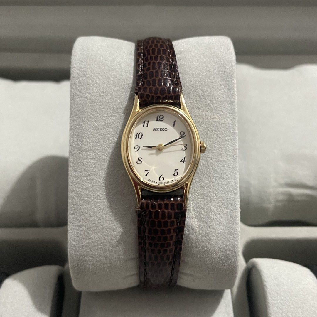 Seiko Oval Face Dainty Watch (Category: Women's Watches) located in Manila. Submitted by darimilkkk_ (Listing ID 1462891250, Image 1). Description: - Classic Seiko watch for women - Gold-tone oval case - Clean white dial with Arabic numerals - Brown textured leather strap - Simple and elegant design - Ideal for everyday wear or dressing up - All original.