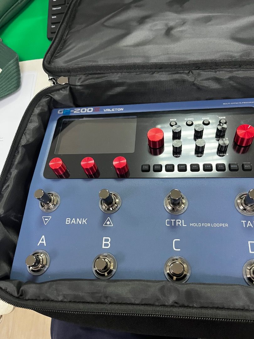 Seven string electric guitar & Valeton GP-200X Multi-Effects Processor (Category: Musical Instruments) located in Caloocan City. Submitted by valtemplo (Listing ID 1462917968, Image 3). Description: - Black 7-string electric guitar SGR 7 string ISSUE:need new strings 14k asking - Valeton GP-200X multi-effects processor with original case 22k asking - Features numerous knobs and footswitches for versatile sound shaping - Both items are in good wor