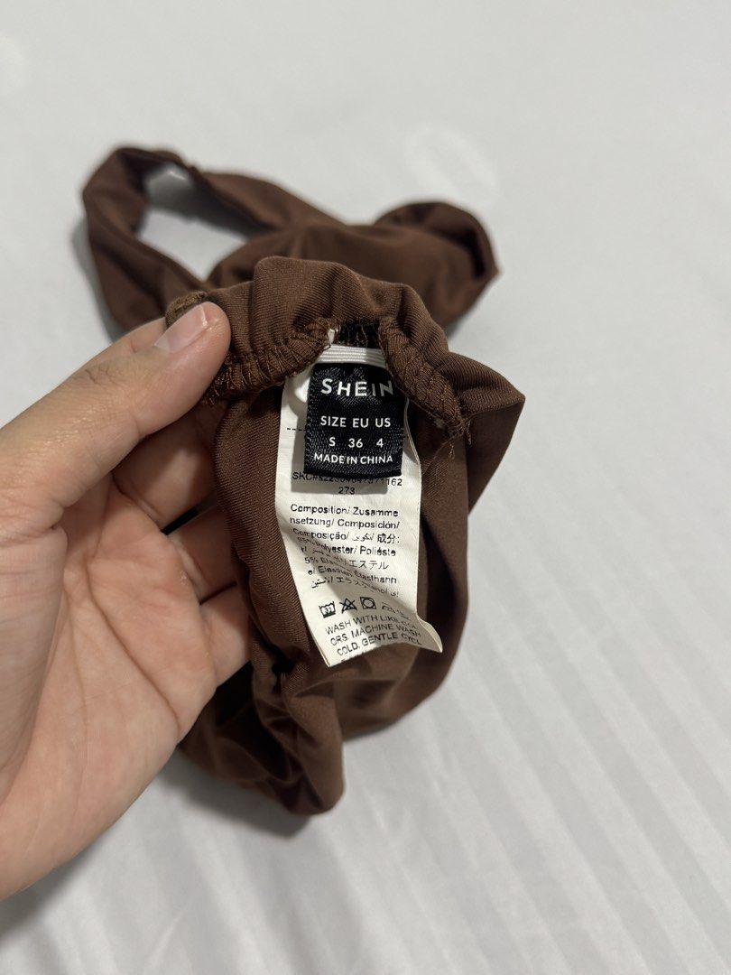 SHEIN Brown Halter Neck Ruched Crop Top (Category: Sleeveless) located in Pasig City. Submitted by niks.tb (Listing ID 1462934491, Image 3). Description: Decluttering items! Decluttering Items! . You can also buy ALL TOPS (last slide) as a set for P700.00. 📍Kapitolyo, Pasig .