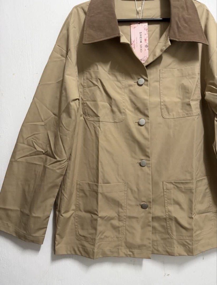 SHEIN Khaki/Brown Coat/Jacket (Category: Coats, Jackets and Outerwear) located in Makati City. Submitted by julivyian (Listing ID 1462915089, Image 2). Description: - SHEIN Mod jacket - Brown corduroy collar - Button-up front XS on tag but can fit up to Small (oversized) Just ordered it from Shein. Malaki pala sya sa akin. New with tag pa. Bought for 700+ .