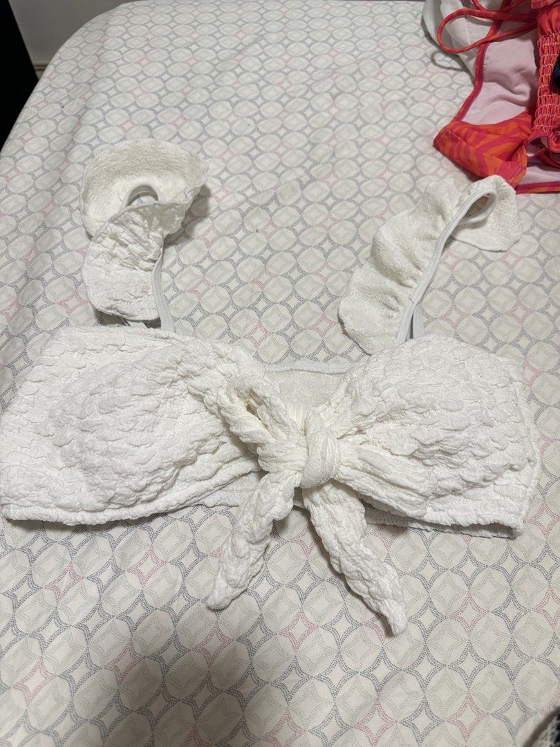 [SHEIN] white textured ribbon bikini top (Category: Bikinis & Swimsuits) located in Cainta. Submitted by m4tchyyy (Listing ID 1463017969, Image 1). Description: 🌀 textured ribbon tie feature 🍀 mop: gcash or bdo 🍀 mod: j&t, ggx, or same day delivery within mm.