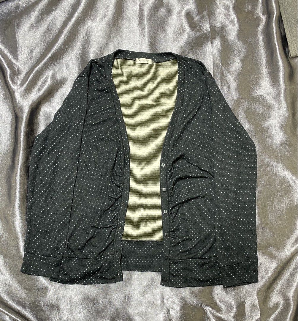 SHELLNAR Striped Cardigan with Polka Dots (Category: Coats, Jackets and Outerwear) located in General Trias. Submitted by kevinthriftshop (Listing ID 1462887546, Image 2). Description: - Black cardigan with white polka dots - Size: L on tag (Best fit medium) - Button-up front - Ruched detailing on the sides - Striped inner lining - Ideal for layering over tops or dresses - Comfortable and stylish for casual wear.