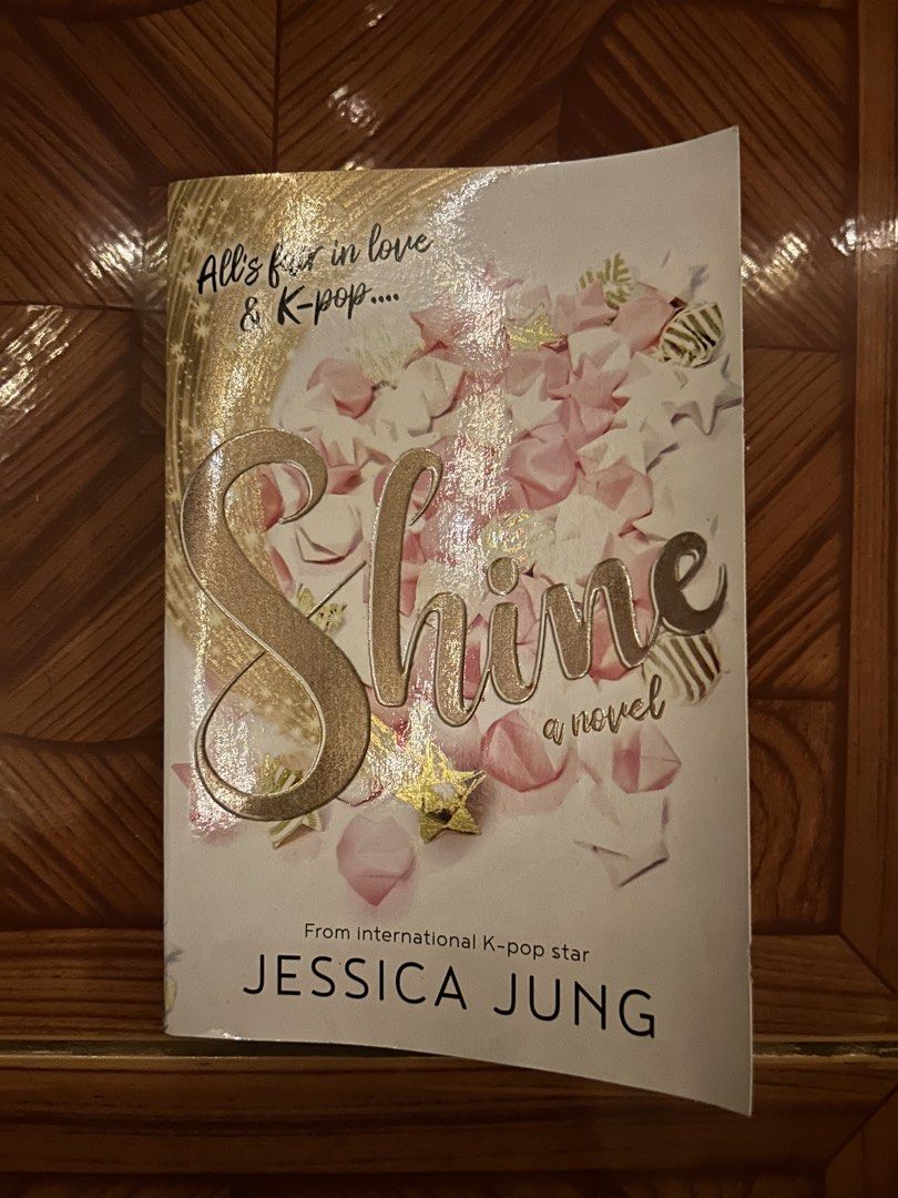 SHINE: A NOVEL (JESSICA JUNG) (Category: Storybooks) located in Pasig City. Submitted by ssalgnowk (Listing ID 1463048129, Image 1). Description: - bought for 528, now selling for ₱250 - there are creases due to storage but everything else is in good condition.
