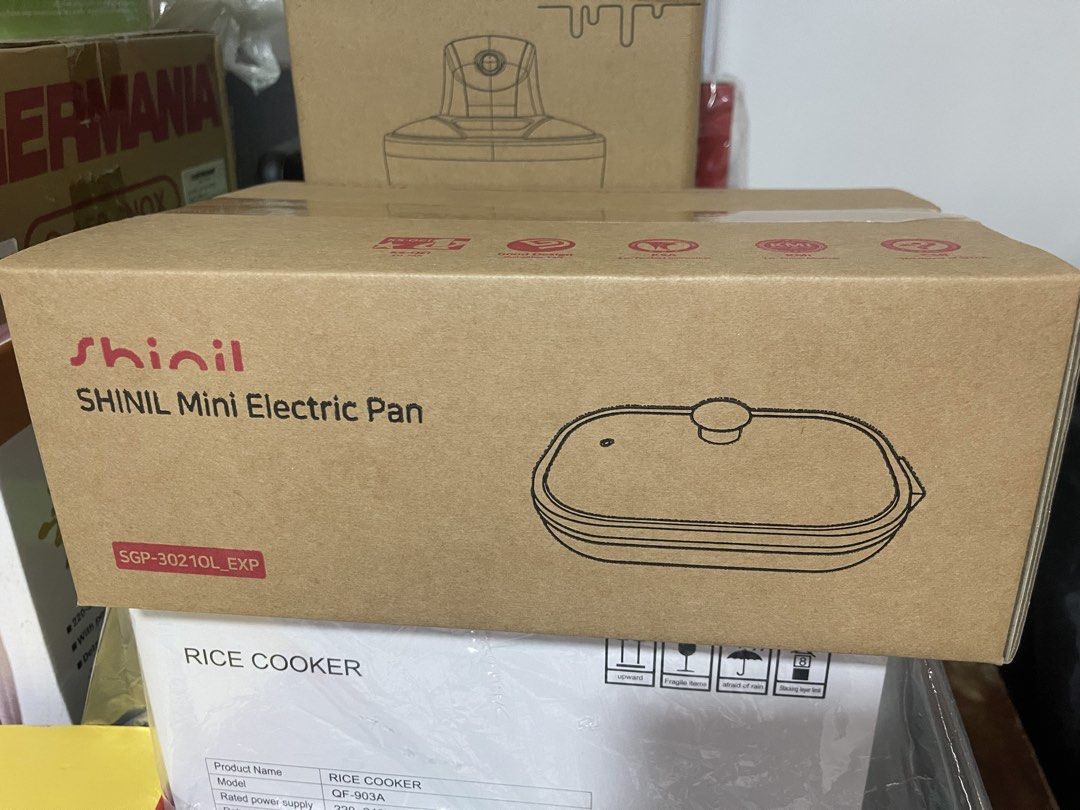 Shinil Mini Electric Pan SGP-3021OL_EXP (Category: Cookware & Accessories) located in Malabon City. Submitted by charlize.ph (Listing ID 1462906239, Image 1). Description: - Shinil Mini Electric Pan - Model: SGP-3021OL_EXP - Voltage: 220V-60Hz - Power: 700W - Material: Aluminum body with heat-resistant tempered glass lid - Coating: Fluororesin (non-stick) - Origin: Made in Korea - Ideal for: Quick meals and fast cooking.