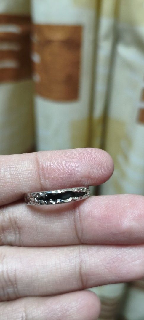 Silver Ring with Unique Pattern Japan source (Category: Rings) located in Quezon City. Submitted by gemaicloset (Listing ID 1463029102, Image 2). Description: - Simple silver band ring - Textured, organic pattern - Contrasting black inlay - Ideal for everyday wear - Works as a subtle statement piece - Great for stacking with other rings.