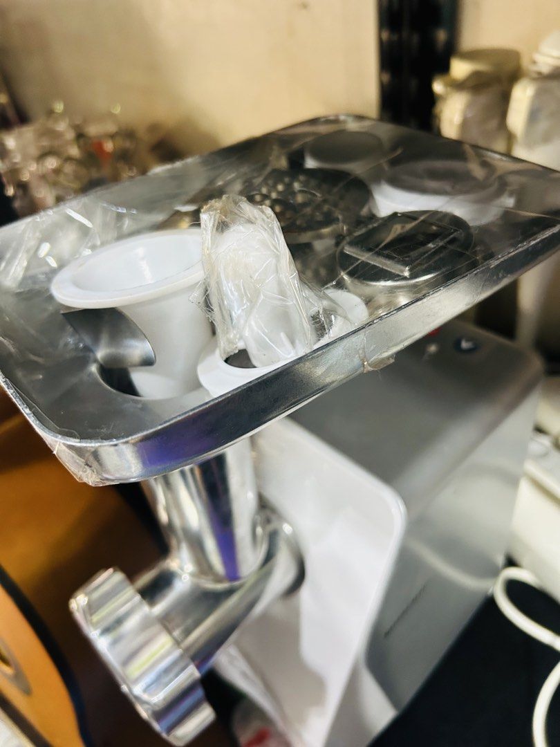 Silvercrest Meat Grinder with Accessories (Category: Juicers, Blenders & Grinders) located in Manila. Submitted by starbalesukandjapansurplus (Listing ID 1462897942, Image 3). Description: - Brand: Silvercrest - Type: Electric Meat Grinder - Condition: Tested and working - Features: Comes with various grinding plates and attachments - Benefits: Grinds meat quickly and efficiently, easy to assemble and clean - Ideal for: Home use, a handy kitchen 