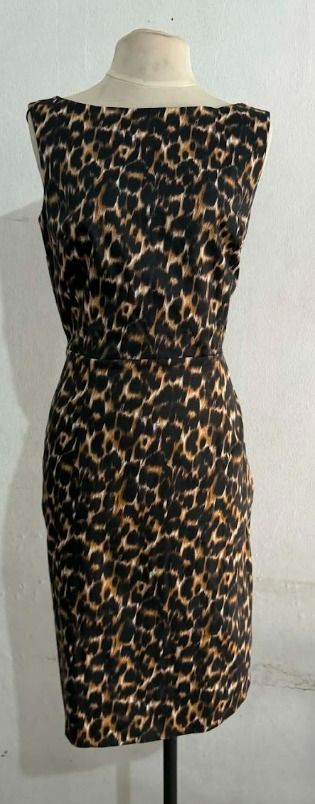 Sleeveless Leopard-print Sheath Dress (Category: Dresses) located in Manila. Submitted by hyper.hertz. (Listing ID 1463022122, Image 1). Description: - Sleeveless dress - Boat neckline - Bold leopard print - Fitted waist - Knee-length hem Negotiations are available.