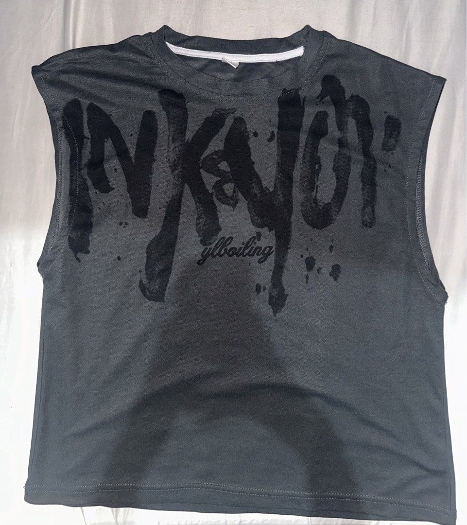 Sleeveless T-shirt Graphic Print (Category: Shirts) located in Manila. Submitted by etain.xo (Listing ID 1463022415, Image 1). Description: - Dark grey sleeveless t-shirt - Plain back - Standard t-shirt fabric feel - Ideal for casual wear.