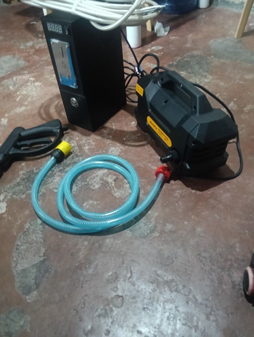 SOARFLY High Pressure Washer with Timer and Gun (Category: Cleaning Tools & Supplies) located in Manila. Submitted by sammymanatad83 (Listing ID 1462914293, Image 1). Description: - SOARFLY Pressure Washer - Includes timer unit - Comes with spray gun - Features a long hose - Ideal for cleaning cars, patios, and other surfaces - Ready to use and works well.