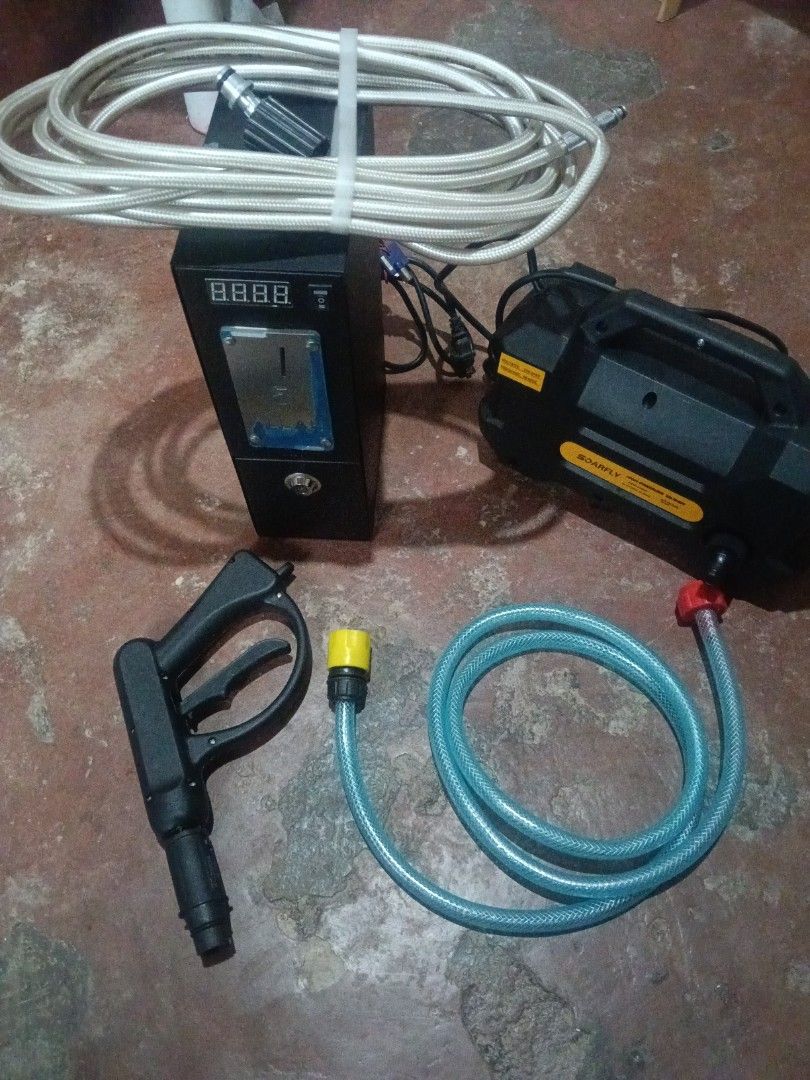 SOARFLY High Pressure Washer with Timer and Gun (Category: Cleaning Tools & Supplies) located in Manila. Submitted by sammymanatad83 (Listing ID 1462914293, Image 2). Description: - SOARFLY Pressure Washer - Includes timer unit - Comes with spray gun - Features a long hose - Ideal for cleaning cars, patios, and other surfaces - Ready to use and works well.