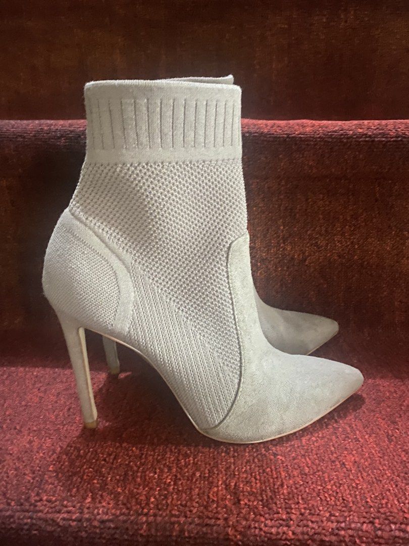 Sock Ankle Boots Stiletto Heel Pointed Toe (Category: Boots) located in Baguio. Submitted by SweetRepeat (Listing ID 1462896542, Image 3). Description: - Stylish brown sock boots - Pointed toe design - Elegant stiletto heel (approx. 3 inches) - Comfortable knit sock upper with faux suede accents - Ideal for dressing up your outfits -size 6.5.