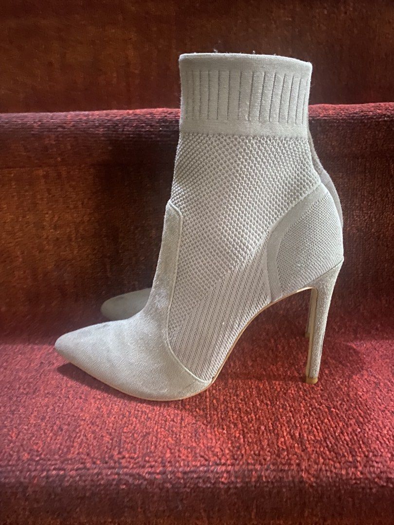 Sock Ankle Boots Stiletto Heel Pointed Toe (Category: Boots) located in Baguio. Submitted by SweetRepeat (Listing ID 1462896542, Image 2). Description: - Stylish brown sock boots - Pointed toe design - Elegant stiletto heel (approx. 3 inches) - Comfortable knit sock upper with faux suede accents - Ideal for dressing up your outfits -size 6.5.