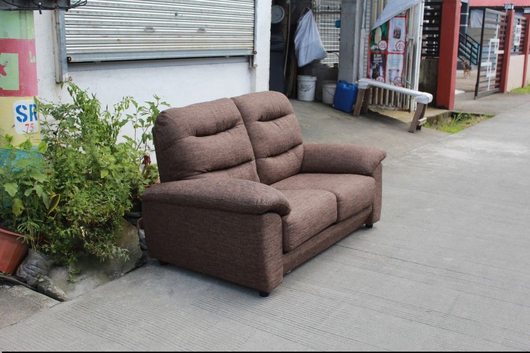 Sofa (Category: Sofas) located in Meycauayan. Submitted by marygracecasimiro (Listing ID 1462948189, Image 3). Description: NITORI 2-Seater High-Back Fabric Sofa Nitori N-Pocket A12 3-seater high-back sofa in dark mocha with comfortable pocket-coil cushioning and excellent head and back support. Perfect for living rooms, lounges or spacious interiors L:63 • W:35 • Seat H:17 • Back H:37 • inches 12,700 pesos only 💚.