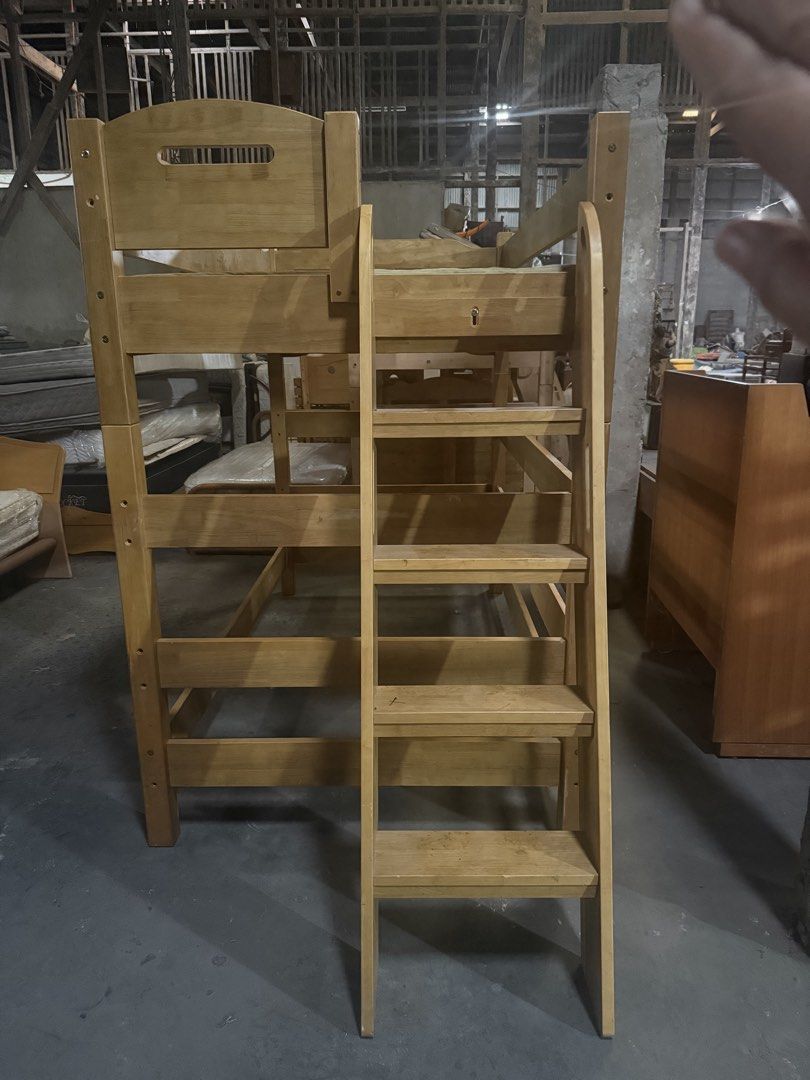 Solid Wood Twin Over Twin Bunk Bed with Ladder (Category: Bed Frames & Mattresses) located in Angeles City. Submitted by maryannmar33098 (Listing ID 1463039449, Image 1). Description: - Sturdy wooden bunk bed - Twin over twin size - Includes ladder for easy access - Bottom bunk comes with a mattress - Solid wood construction - Ideal for kids' rooms or guest rooms - Ready for its new home.