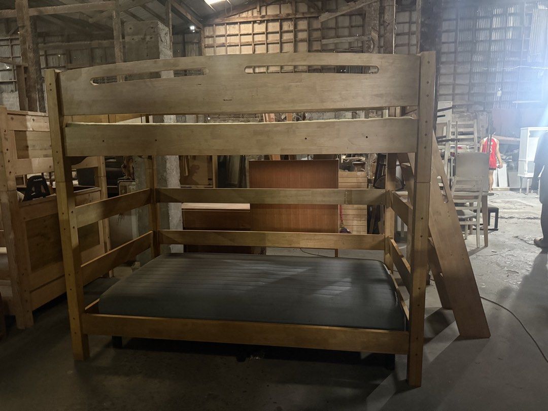 Solid Wood Twin Over Twin Bunk Bed with Ladder (Category: Bed Frames & Mattresses) located in Angeles City. Submitted by maryannmar33098 (Listing ID 1463039449, Image 3). Description: - Sturdy wooden bunk bed - Twin over twin size - Includes ladder for easy access - Bottom bunk comes with a mattress - Solid wood construction - Ideal for kids' rooms or guest rooms - Ready for its new home.