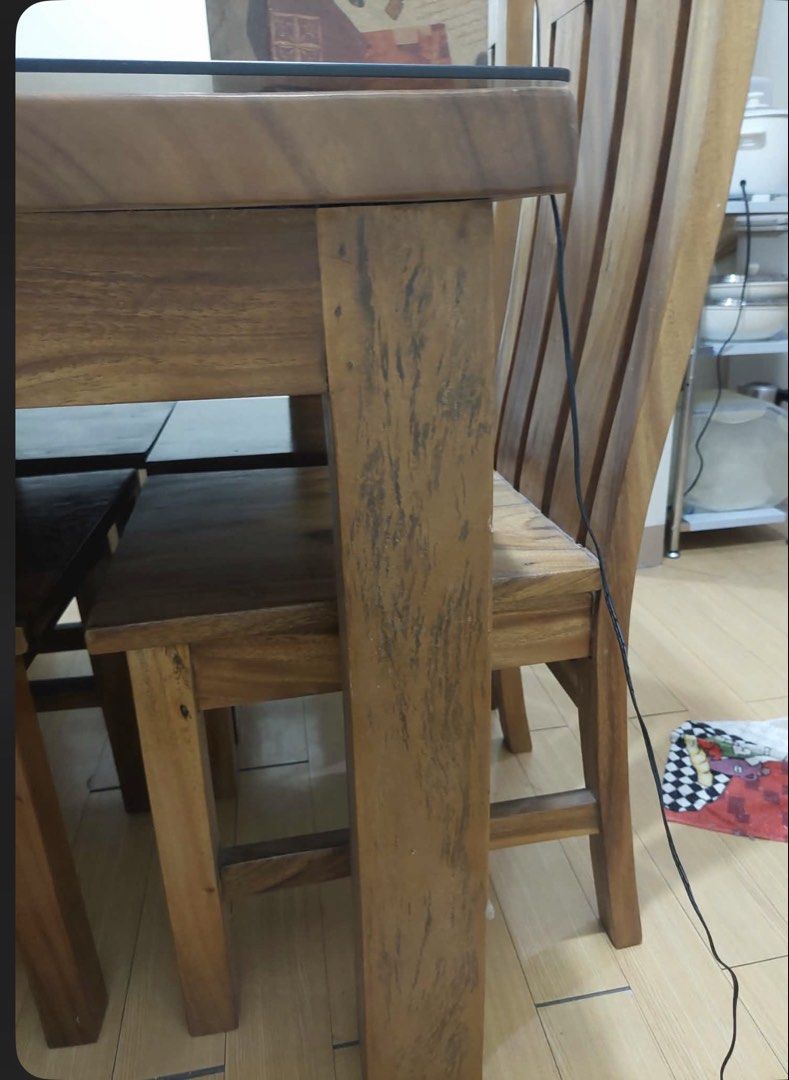 MAHOGANY WOODEN TABLE AND CHAIRS (Category: Tables & Sets) located in Manila. Submitted by micofrance07646 (Listing ID 1462955686, Image 3). Description: Decluttering. Location is in Pasig Free GLASS TOO Free chair covers.