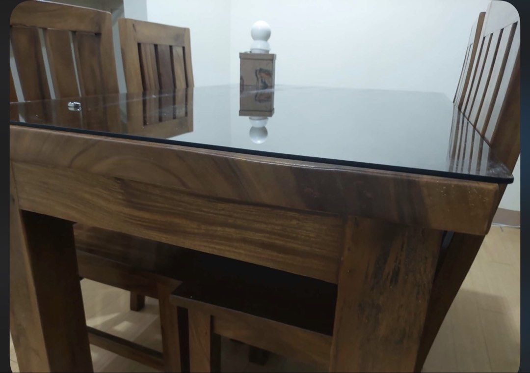 MAHOGANY WOODEN TABLE AND CHAIRS (Category: Tables & Sets) located in Manila. Submitted by micofrance07646 (Listing ID 1462955686, Image 2). Description: Decluttering. Location is in Pasig Free GLASS TOO Free chair covers.