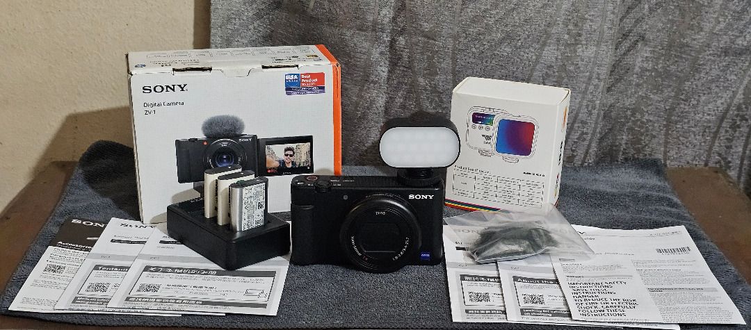 Sony ZV-1 Digital Camera (Category: Cameras) located in Quezon City. Submitted by mb.tan (Listing ID 1463057402, Image 1). Description: PLEASE READ THE DESCRIPTION, PRICE IS NEGOTIABLE - Sony ZV-1 Digital Camera - 5472x3648 max resolution (3:2 aspect ratio) - 20 megapixels - F1.8–2.8, 24-70mm optical zoom - Can shoot RAW photos (saved as ARW files) - Can record 4k quality videos - Good for vlogging, traveling, on-the-go photography with its compa